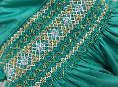 Green with gold smocking ( got matching boys suits ) PRE ORDER HERE IN 2 WEEKS