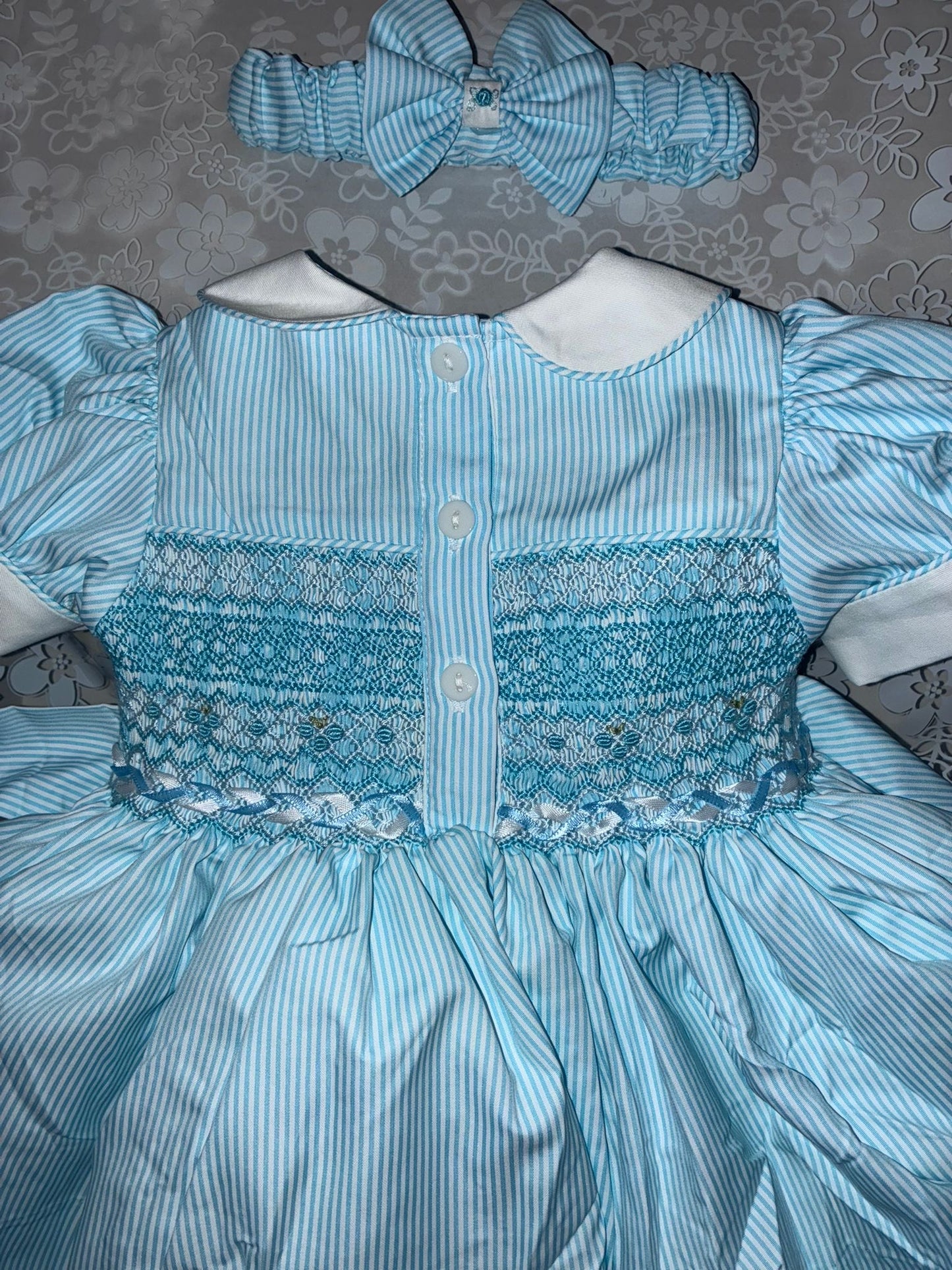 Blue stripe smocked back and front ( got matching boys suit available )