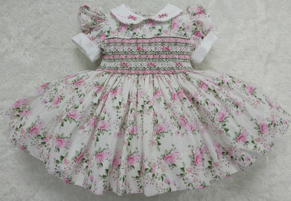 Floral dress smocked back & front with fixed bow at back