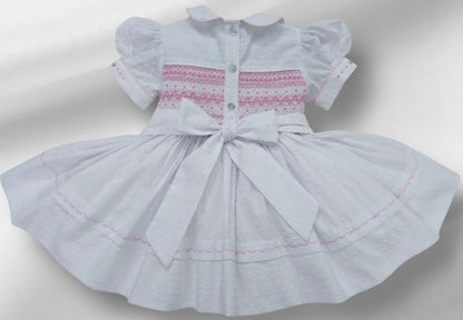 White Smocked back and front Swiss dot with pink