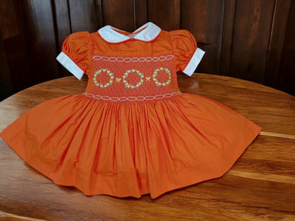 Orange smocked dress