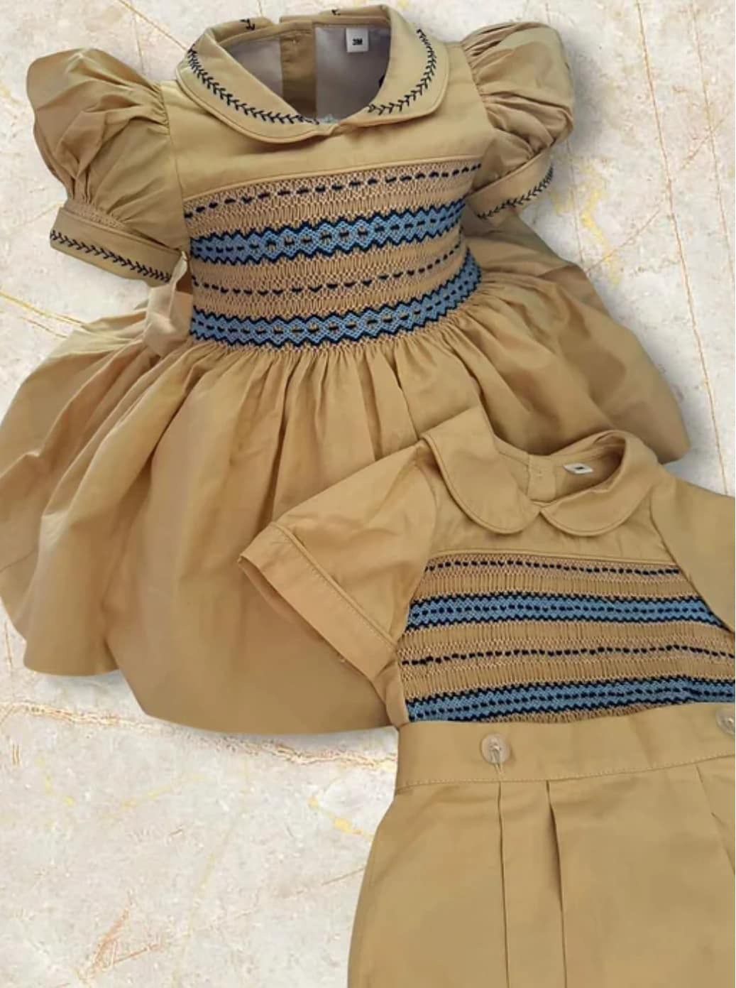 Tan and blue dress smocked back and front ( got some boys suits to match )
