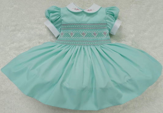 Mint with pink smocking and pearls