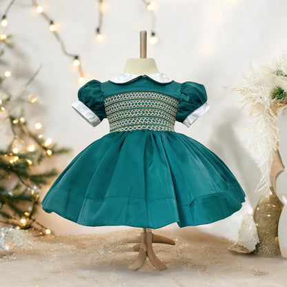 Emerald green satin with gold smocking