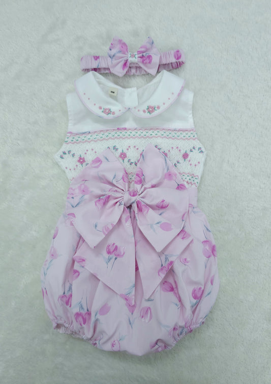 Pink floral sleeveless smocked romper