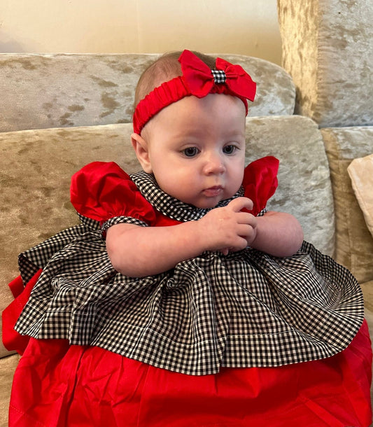 Red dress with black and white full pinny