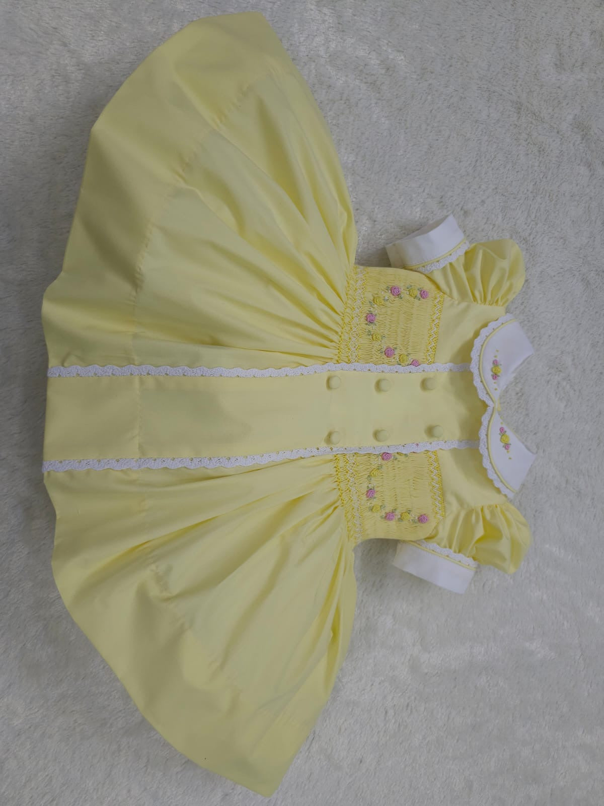 Lemon smocked garland dress with buttons on front