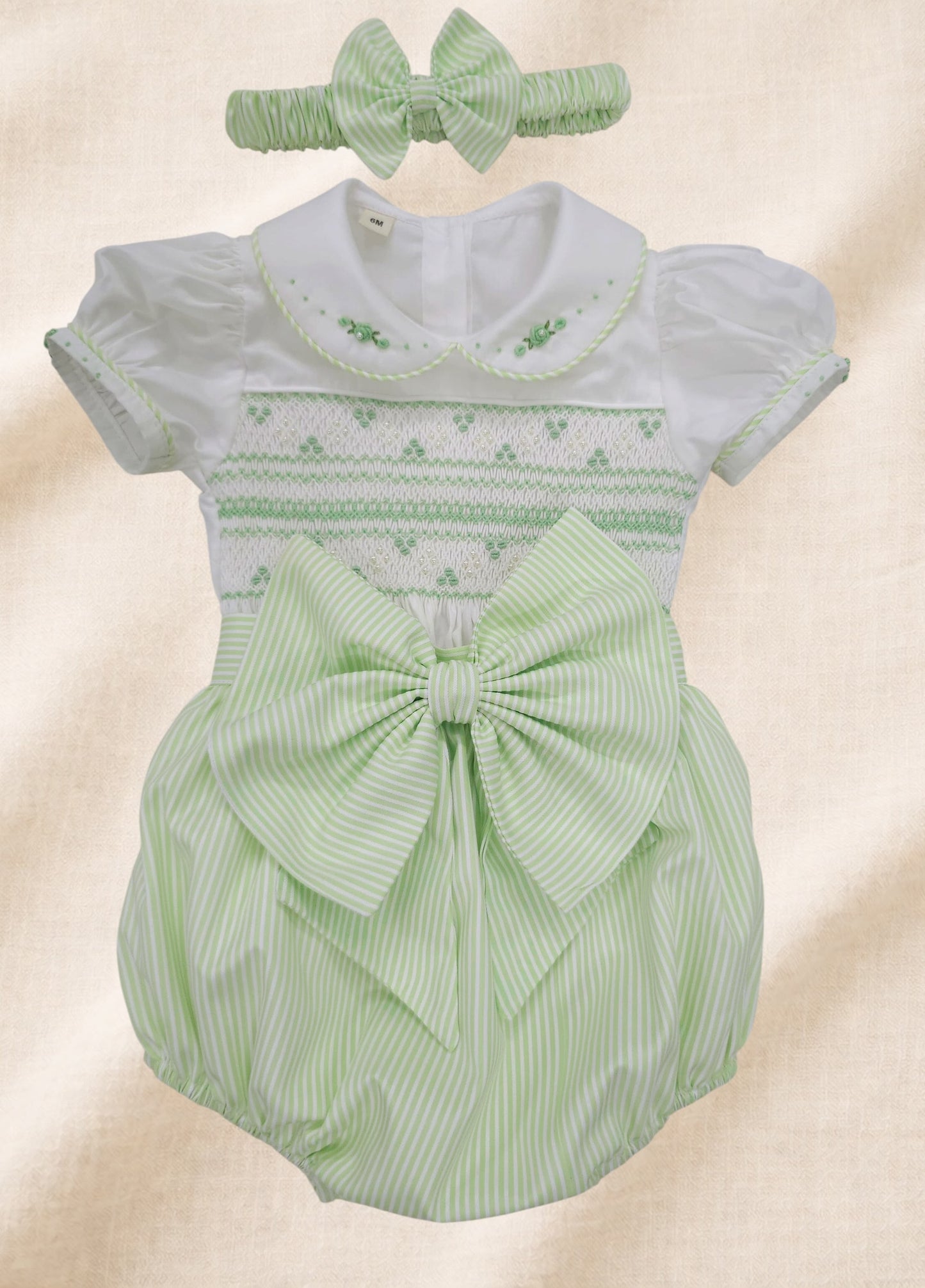 Apple green stripe hand smocked girls romper
