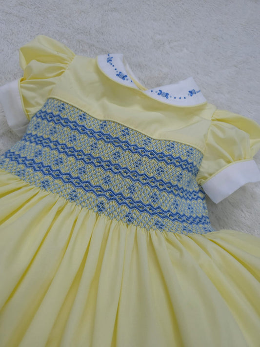 Lemon with blue smocked back and front with fixed bow. ( have matching boys suit available )