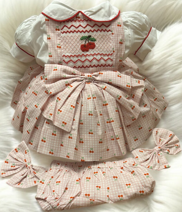 Cherry pinafore comes with knickers and bows
