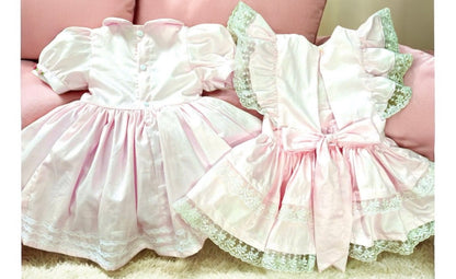 Pink classic dress with smocked pinny
