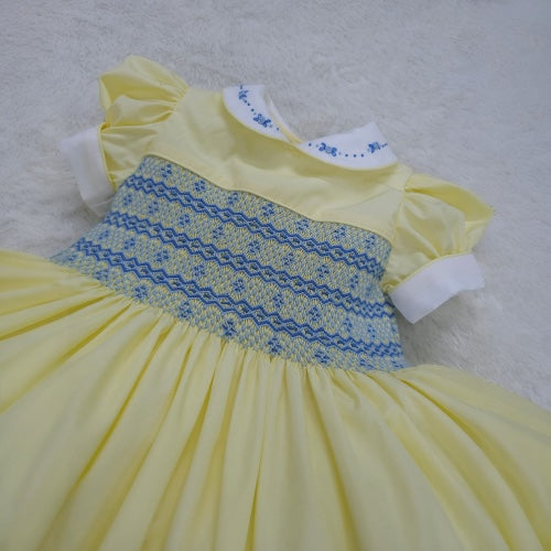 Lemon with blue smocked back and front with fixed bow. ( have matching boys suit available )