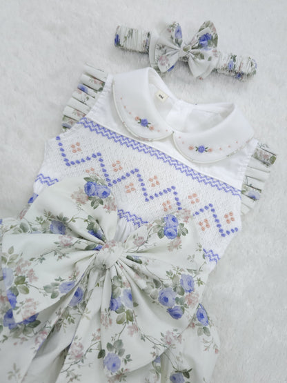 Lilac floral sleeveless hand smocked girls romper