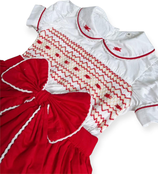 Red smocked skirt romper