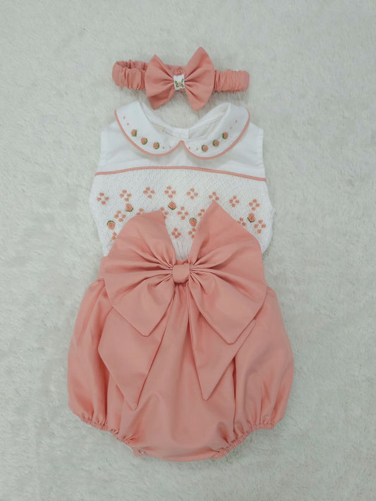Coral sleeveless smocked romper