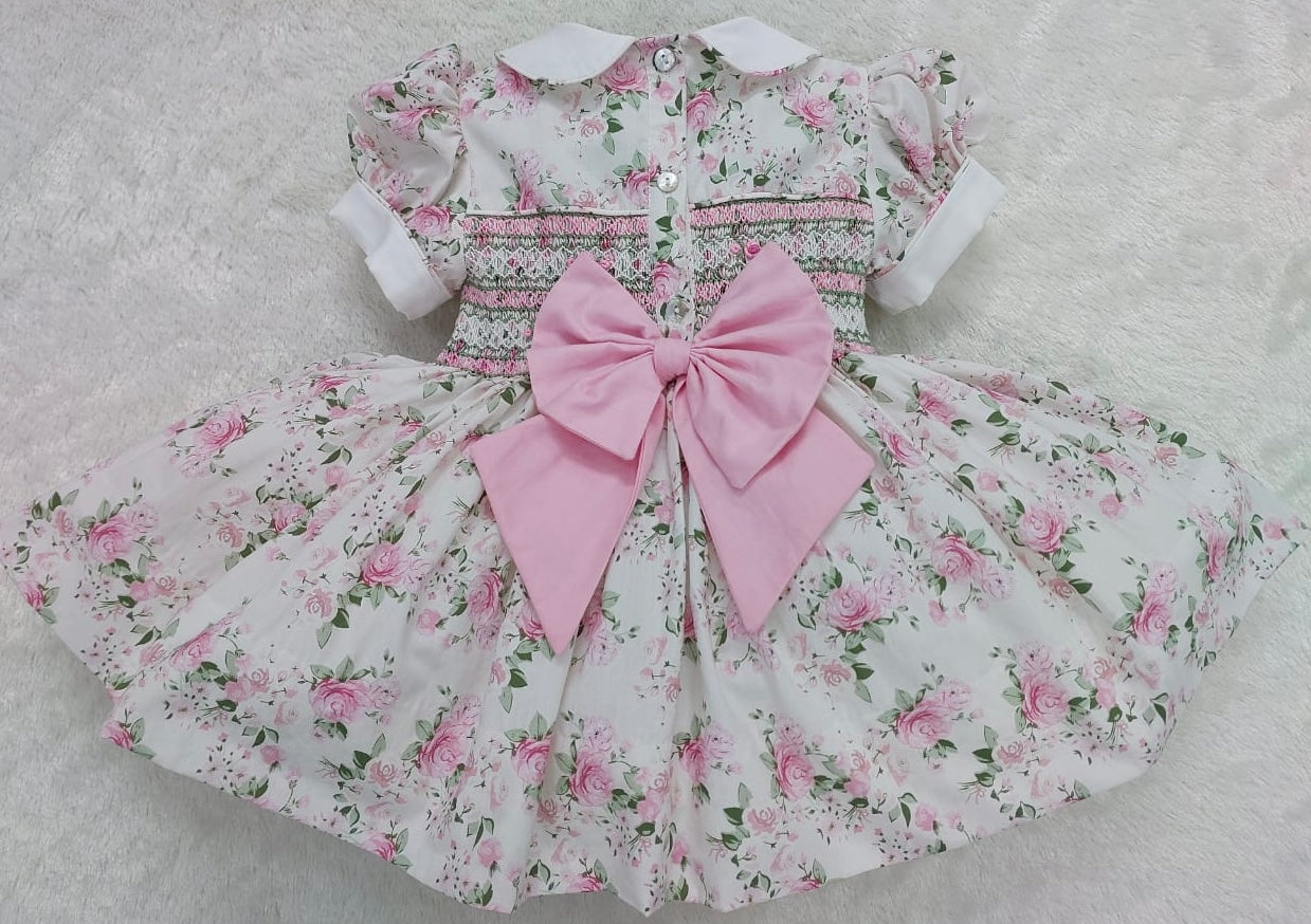 Floral dress smocked back & front with fixed bow at back