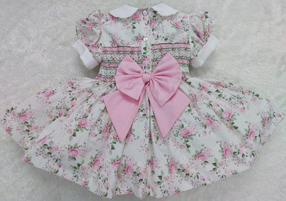 Floral dress smocked back & front with fixed bow at back