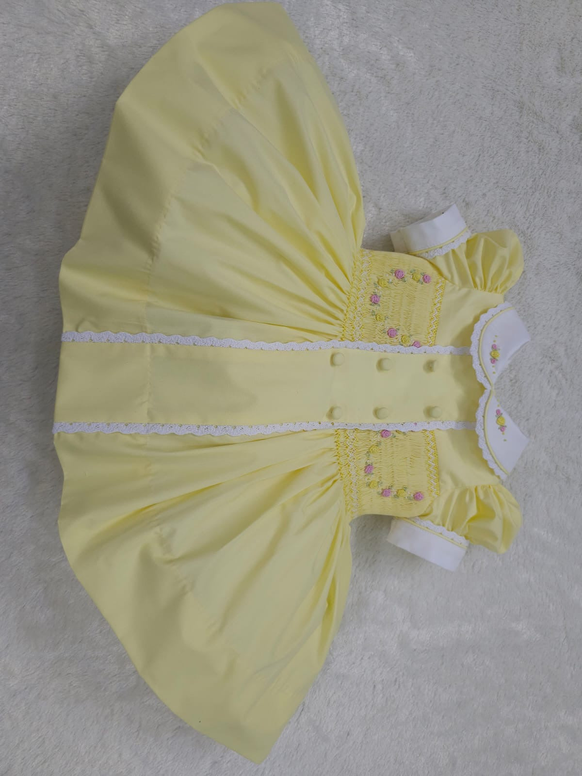 Lemon smocked garland dress with buttons on front