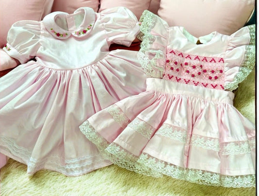 Pink classic dress with smocked pinny