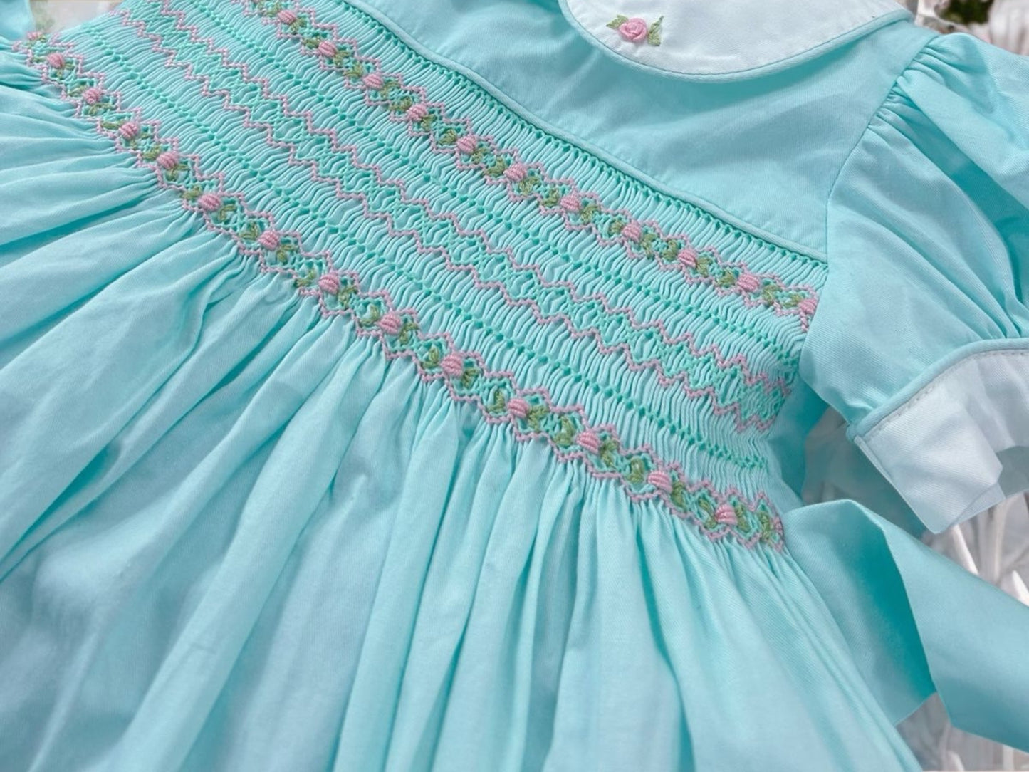 Mint smocked dress with pink embroidery
