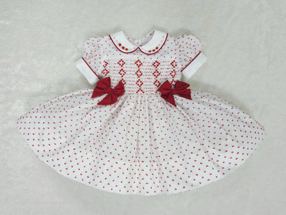 White with red Swiss dot and attached bows