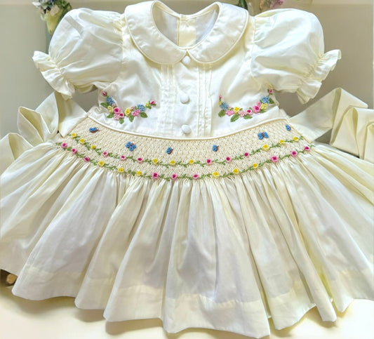 Cream with floral & butterfly smocked waist band