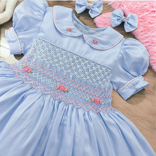 Powder blue with pearl pink smocking