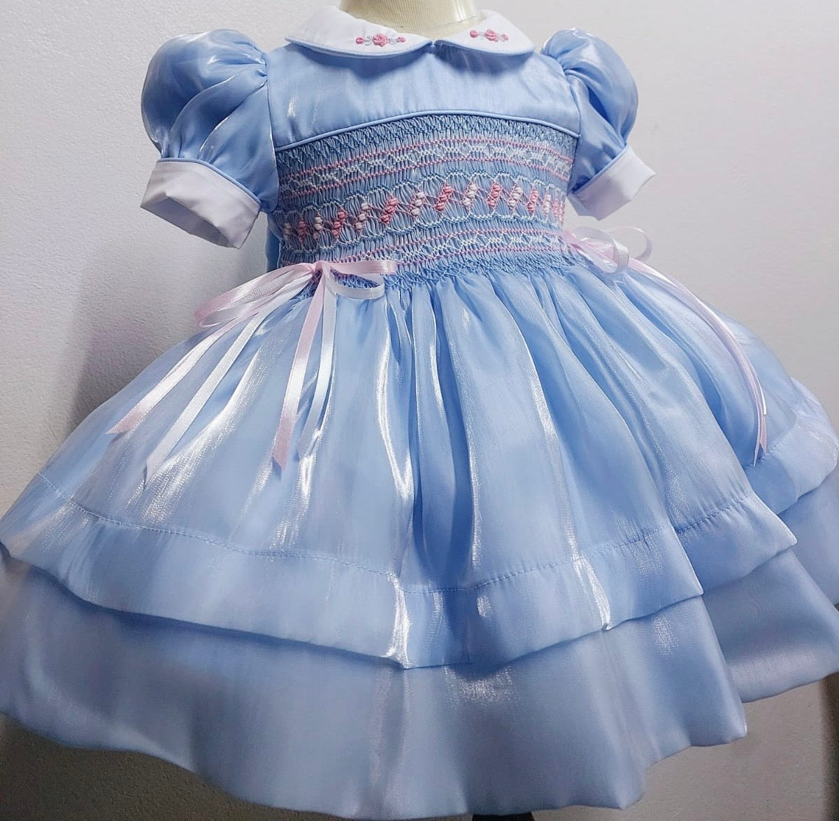 Blue silk with pink & white smocking and ribbon