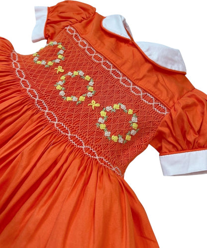 Orange smocked dress