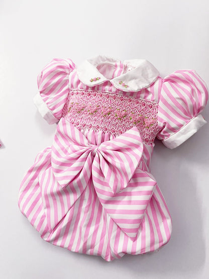 Pink luxe stripe smocked romper comes with hair bow