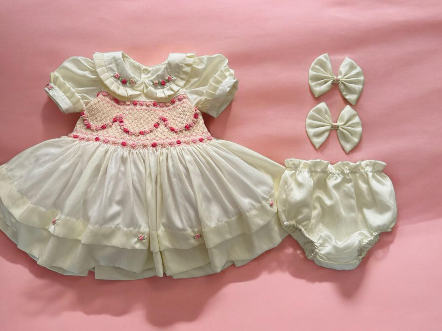 Cream with pink smocking and pink garland