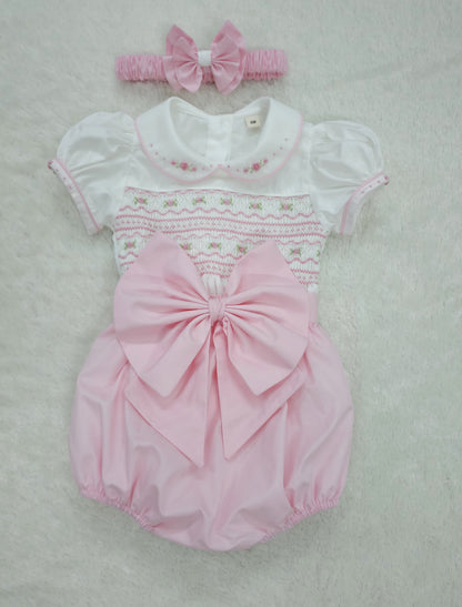 Baby pink hand smocked girls romper
