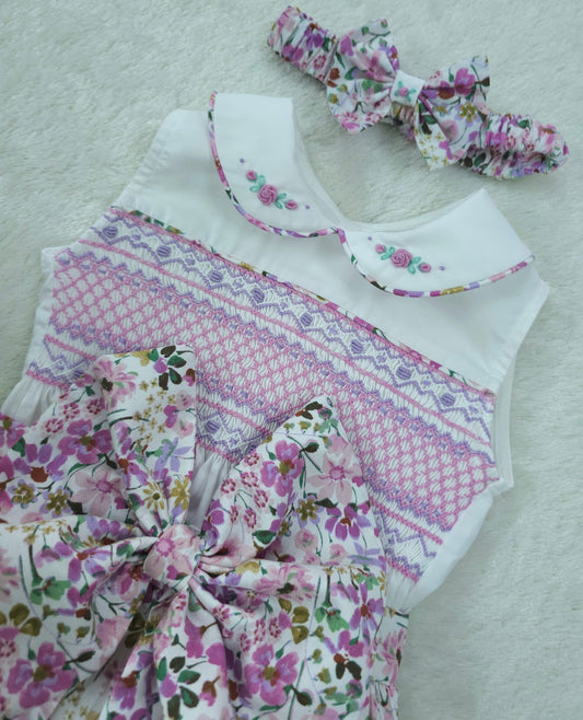 Lilac and pink floral sleeveless smocked romper