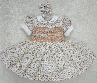 Floral smocked dress with peach embroidered flowers