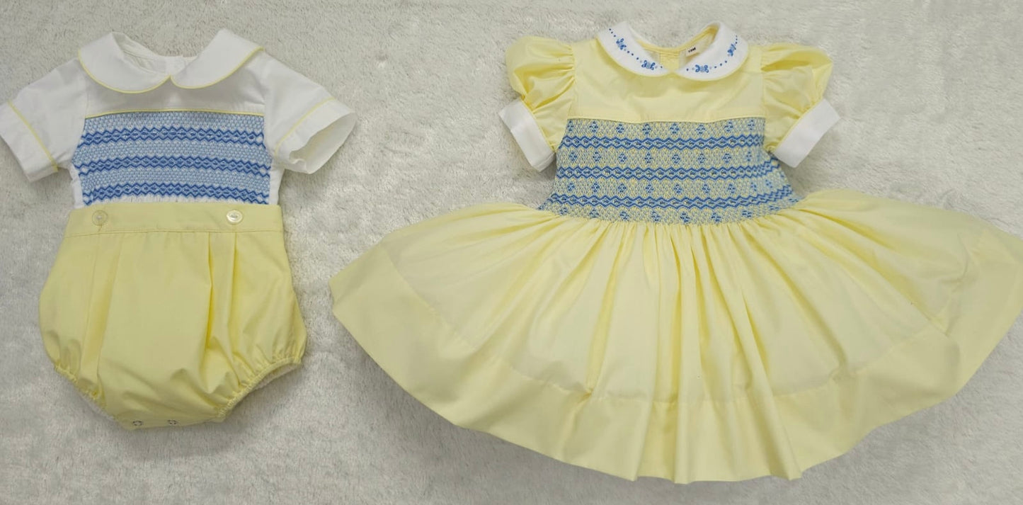 Lemon with blue smocked back and front with fixed bow. ( have matching boys suit available )