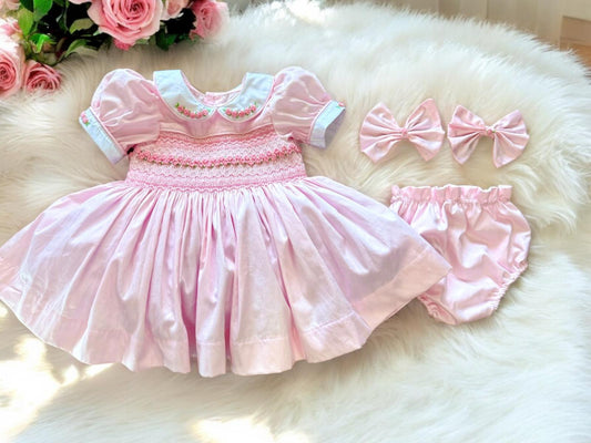 Pink smocked back and front with roses and pearls
