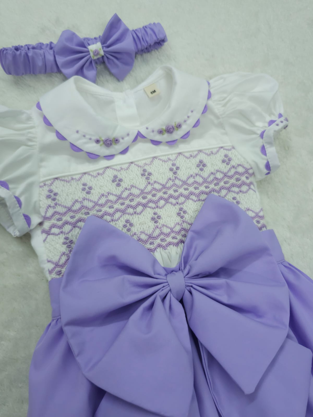 Lilac smocked romper