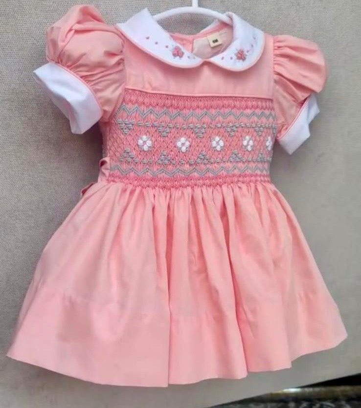 Peach coral smocked back and front with blue and white smocking