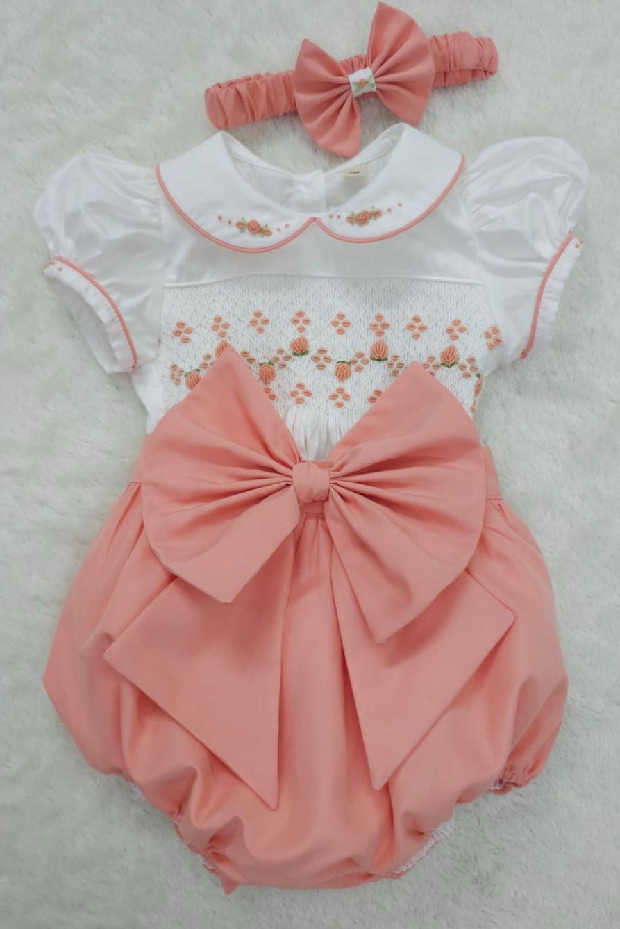 Coral peach smocked romper comes with hair bows or headband for baby sizes