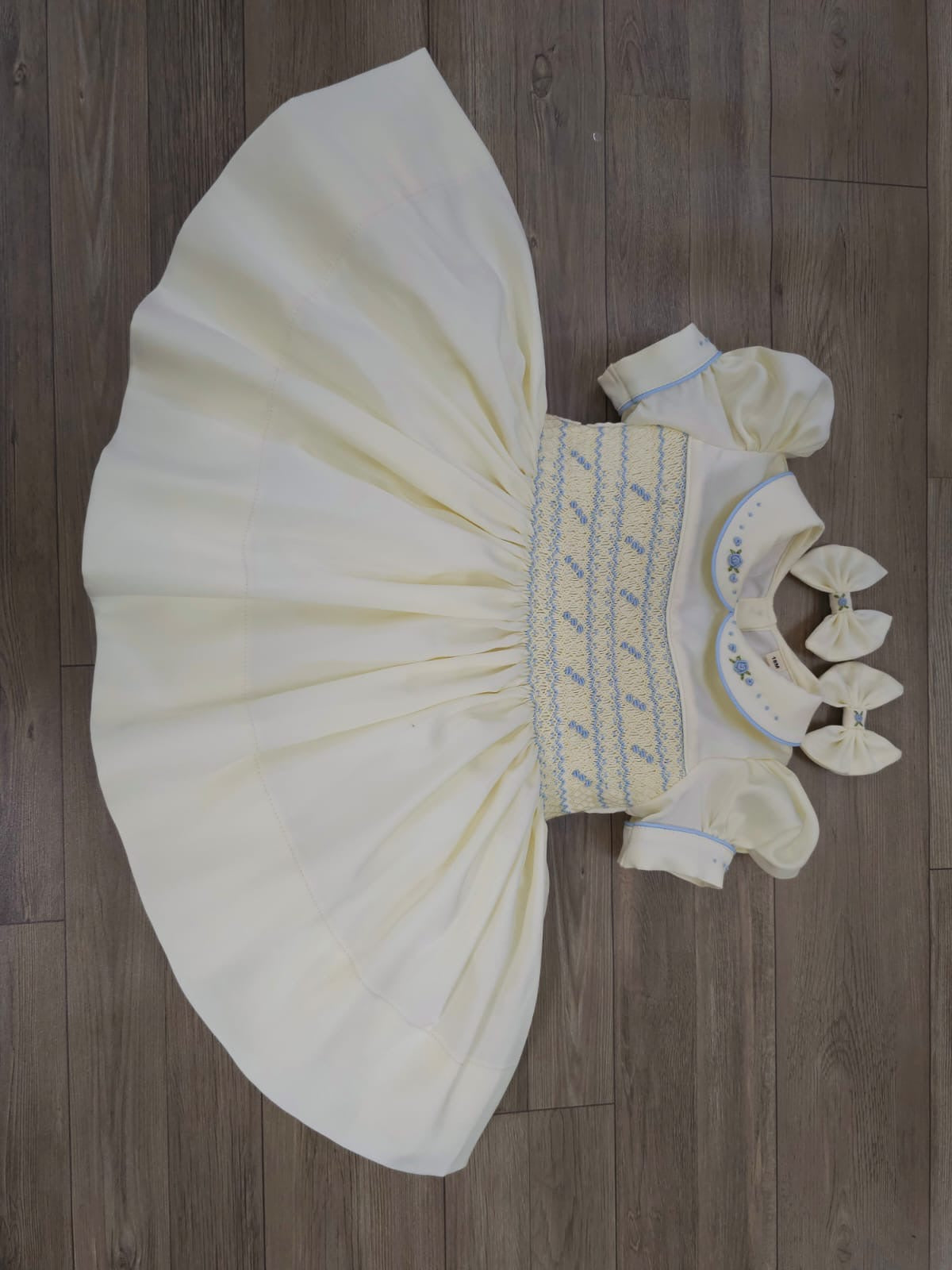 Satin cream with baby blue smocking