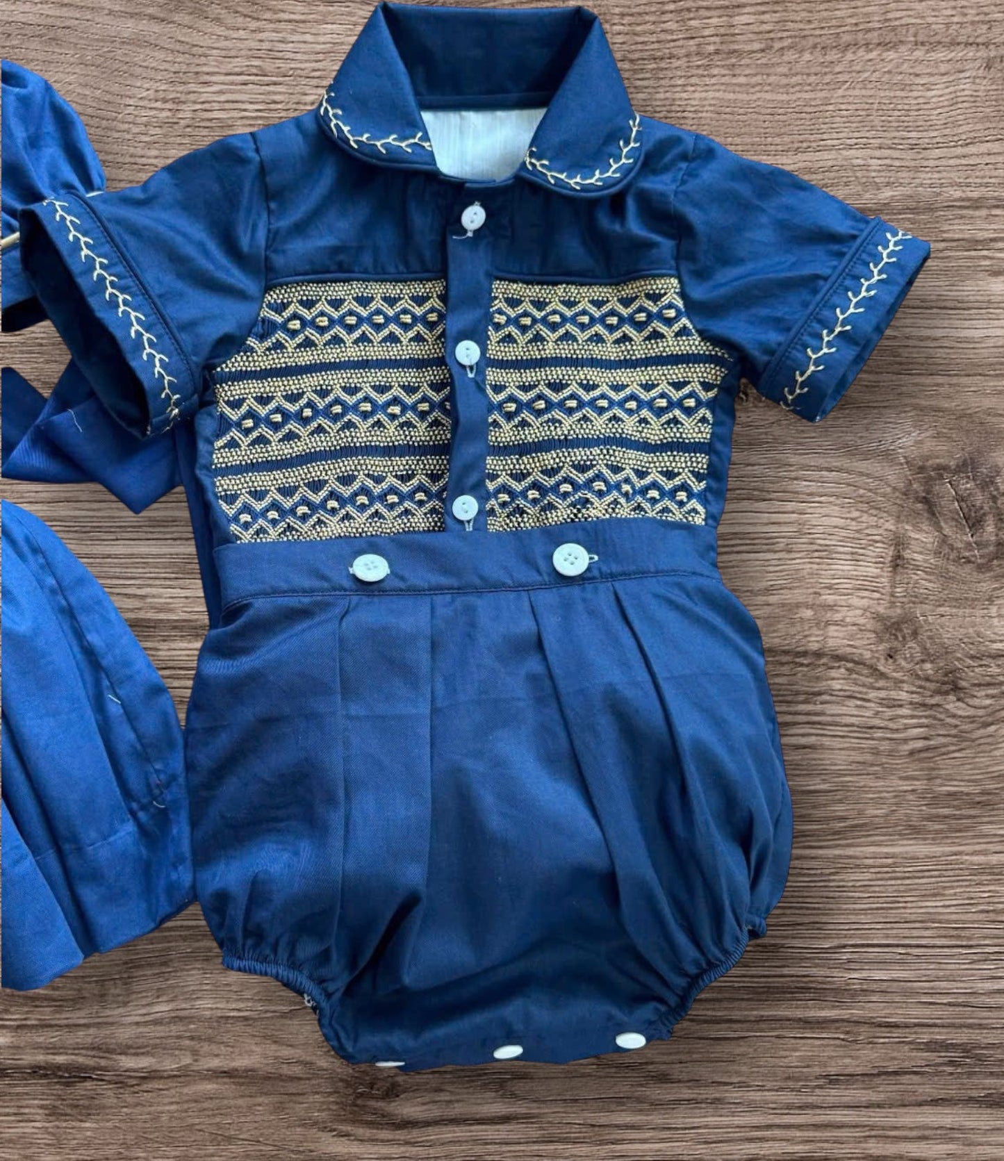 Navy boys suit with gold smocking