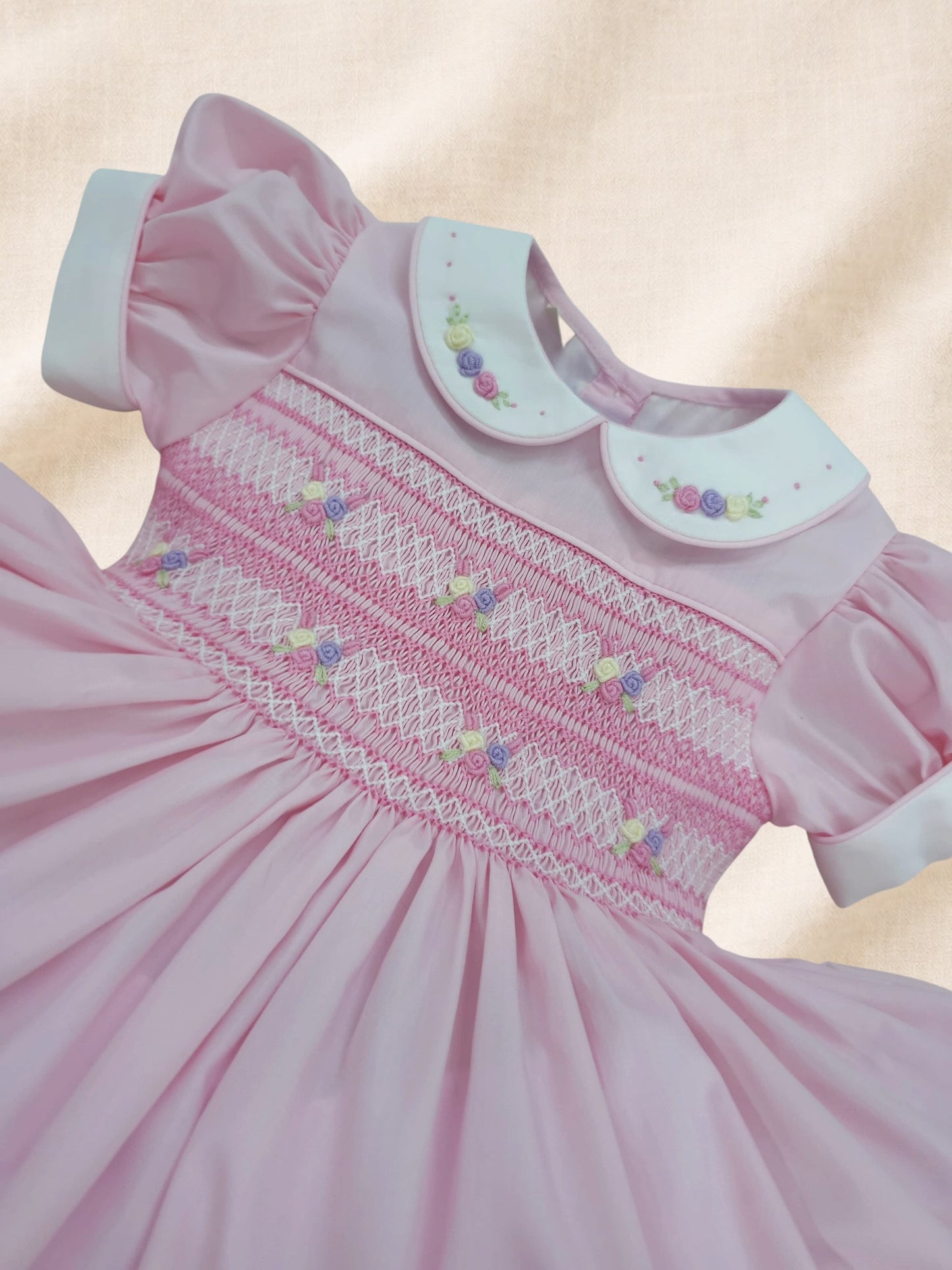 Pink and pastel hand smocked back and front dress