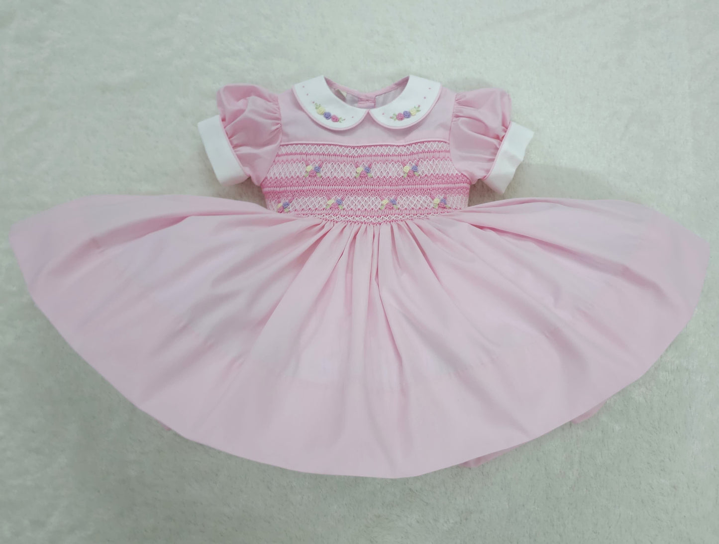 Pink and pastel hand smocked back and front dress