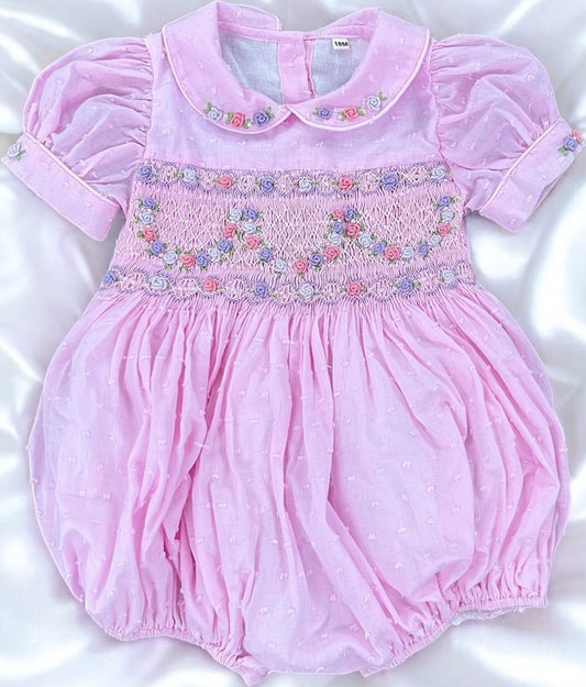 Pink Swiss dot smocked romper