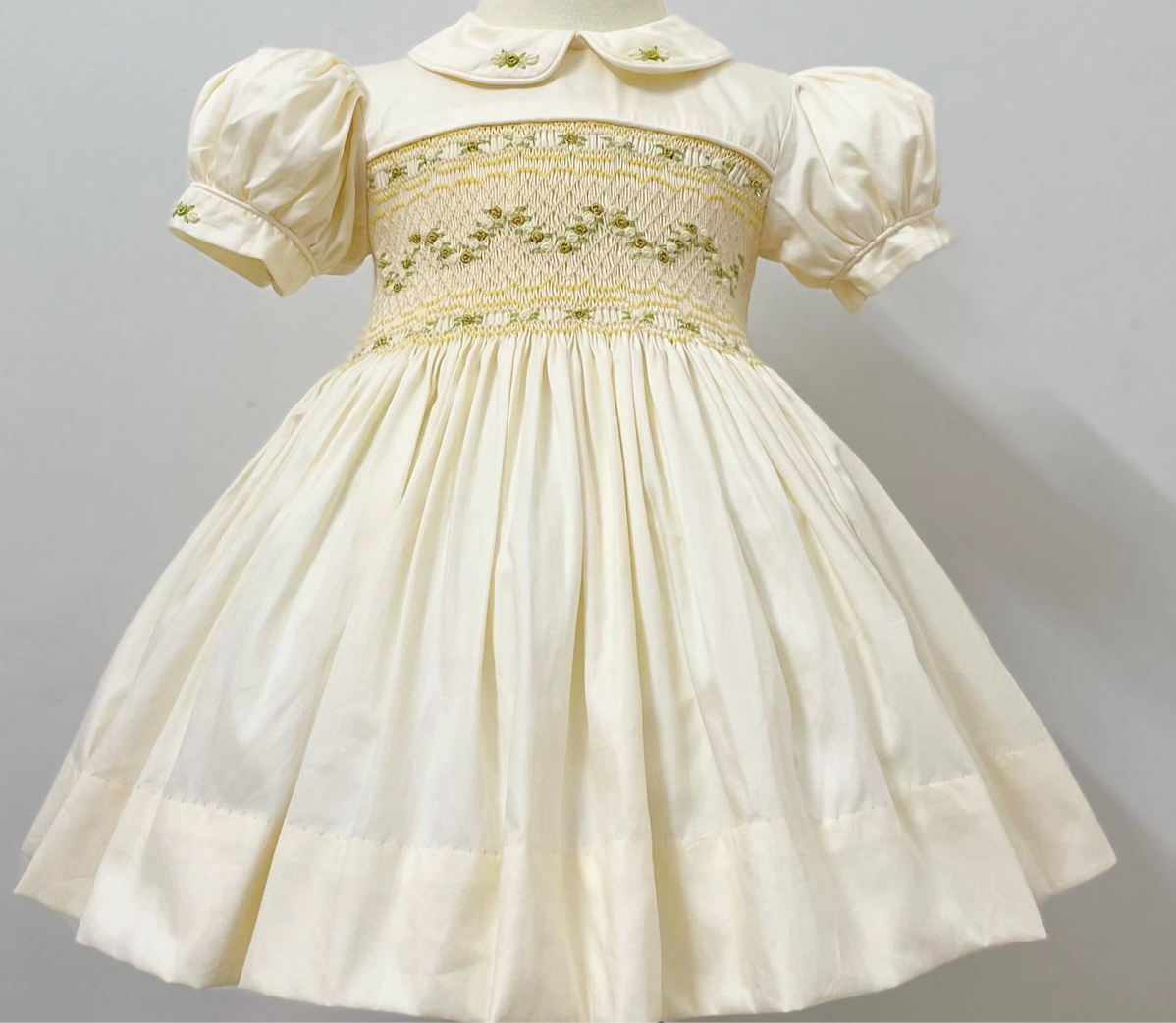 Cream and gold smocked back and front
