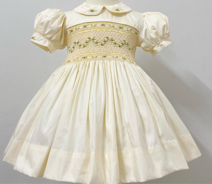 Cream and gold smocked back and front