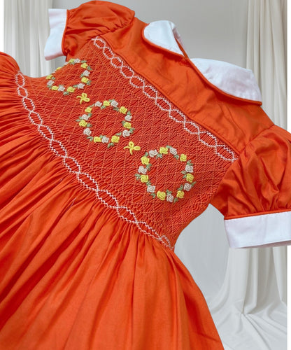 Orange smocked dress