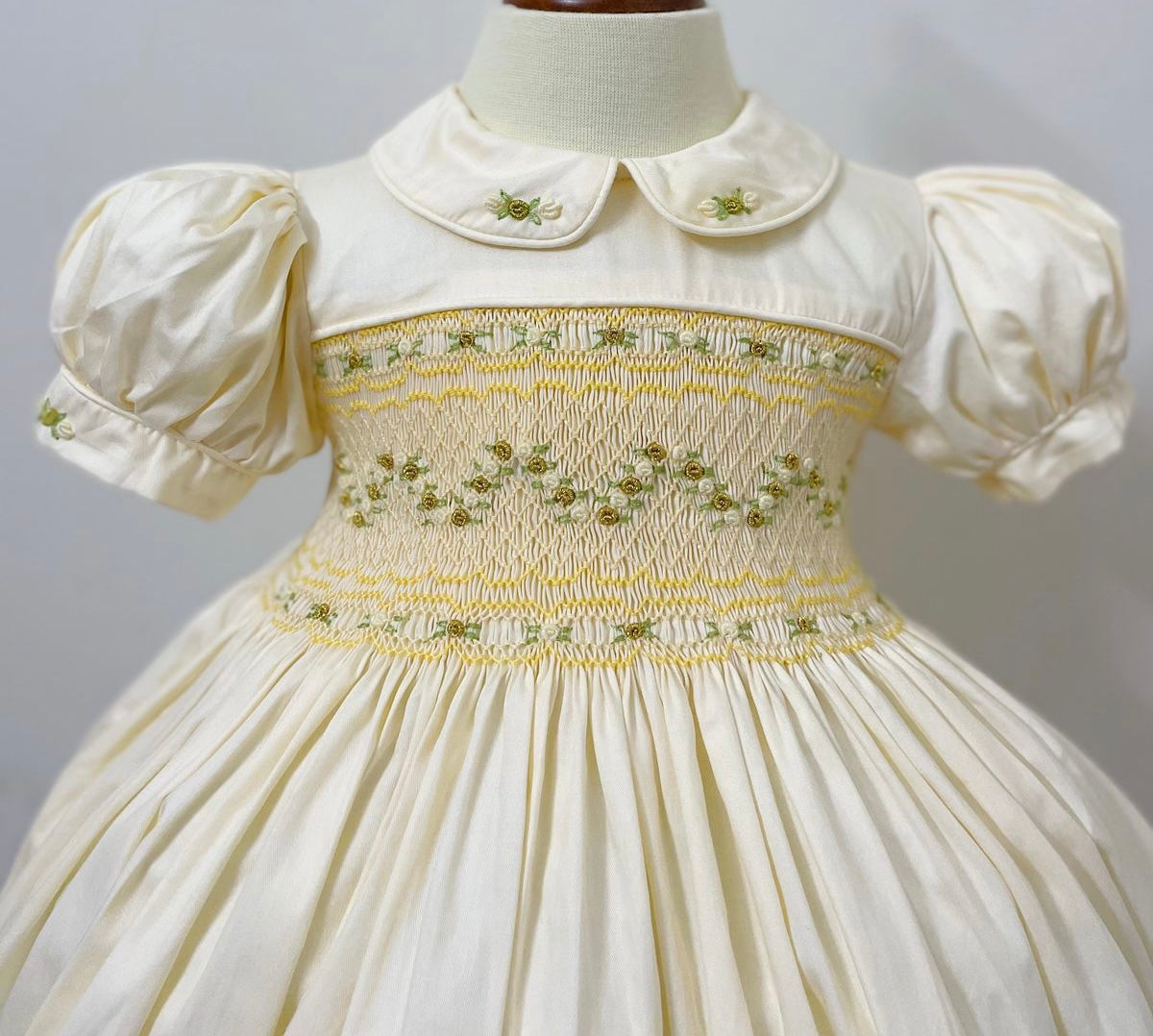 Cream and gold smocked back and front