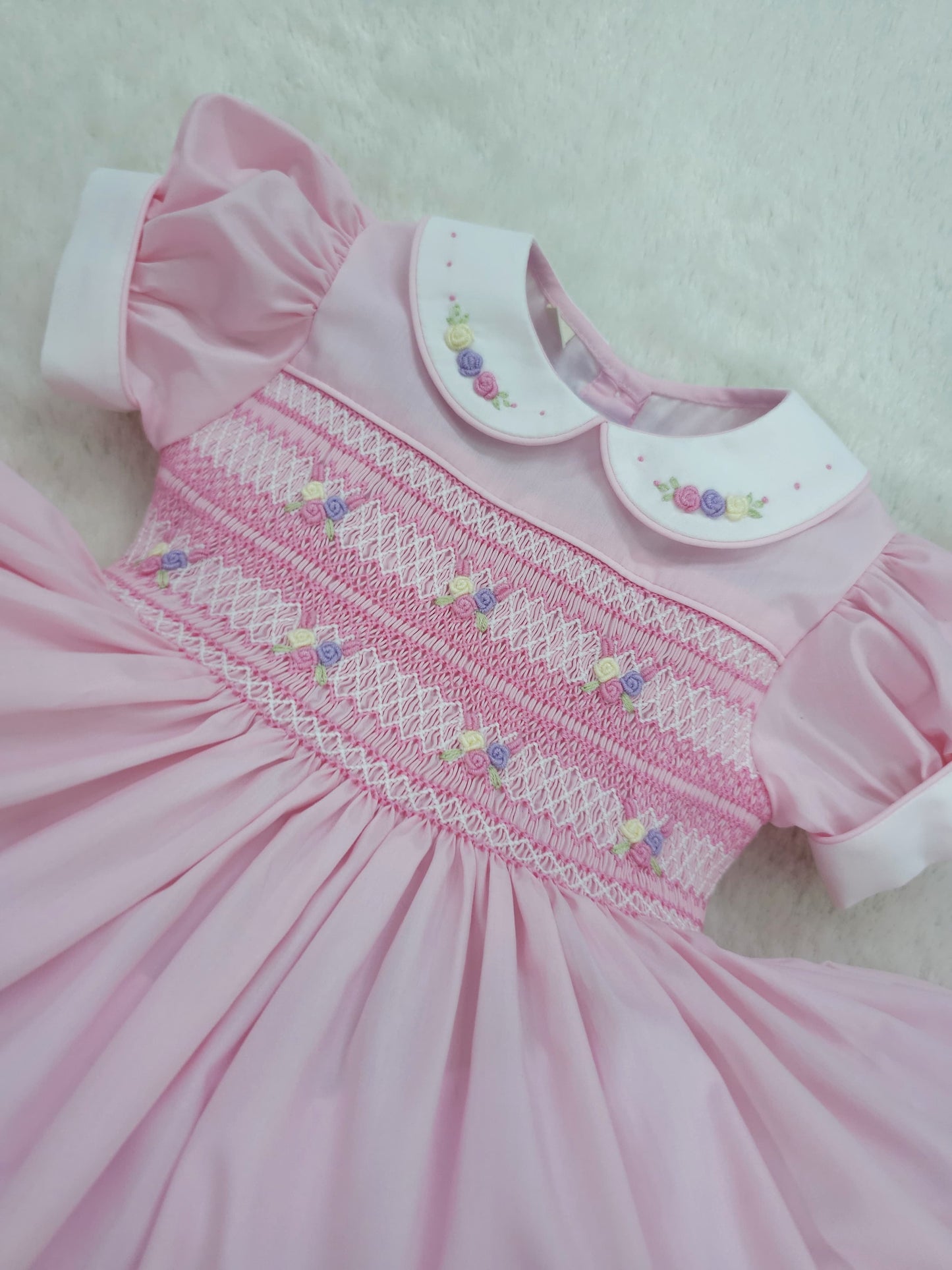 Pink and pastel hand smocked back and front dress