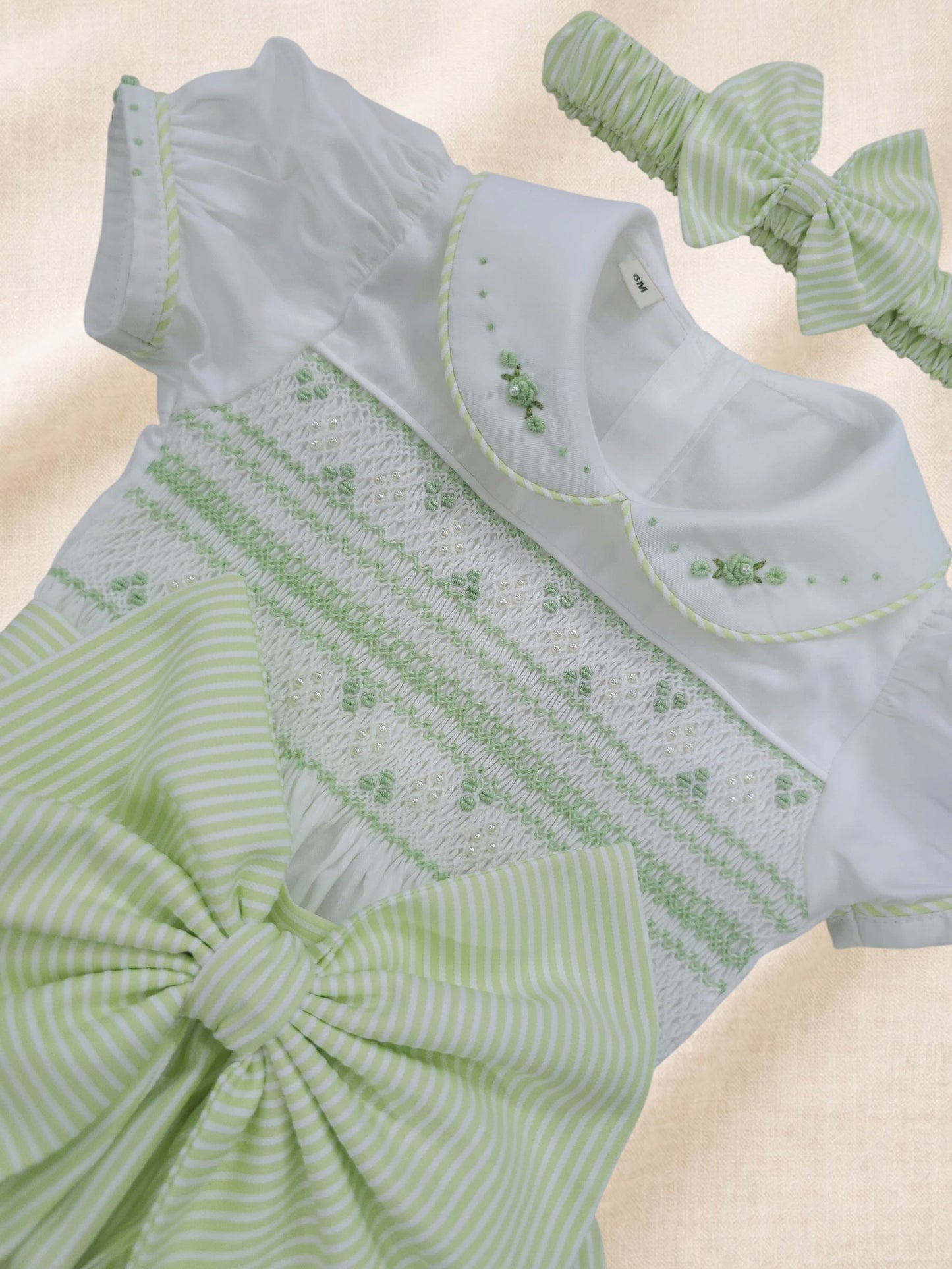 Apple green stripe hand smocked girls romper
